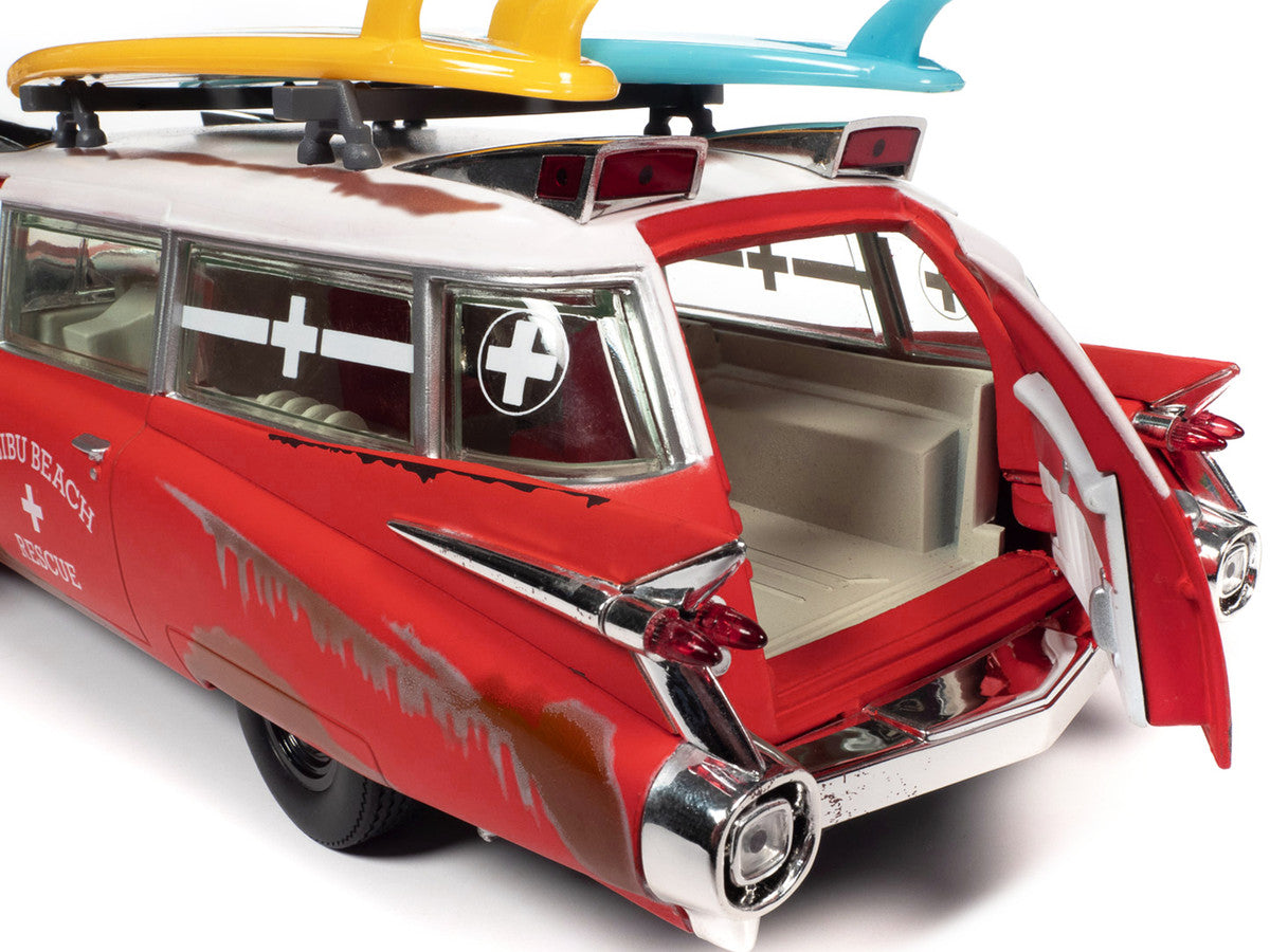 1959 Cadillac Eldorado Ambulance Red with White Top "Malibu Beach Rescue" (Weathered) with Surfboards on Roof "Surf Shark" 1/18 Diecast Model Car by Auto World-4