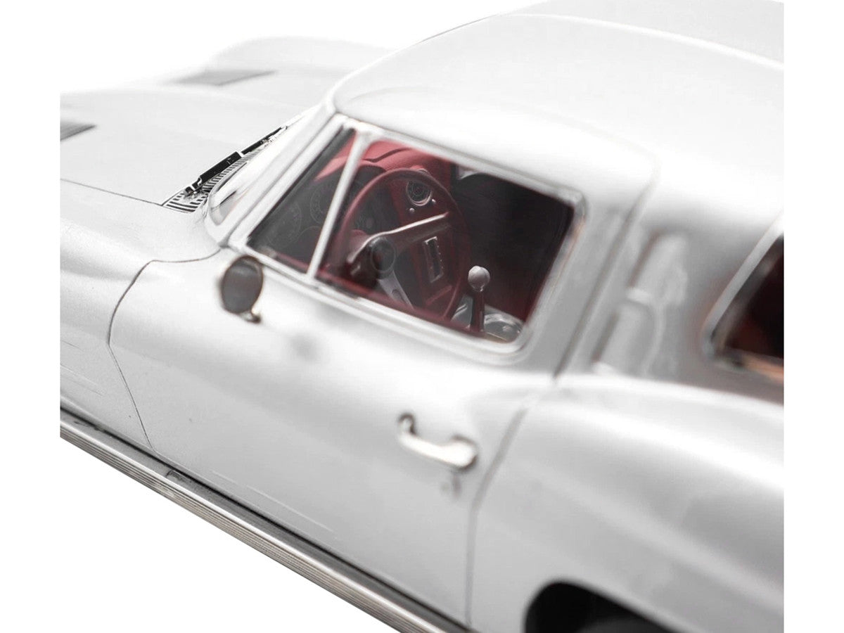 1963 Chevrolet Corvette Sting Ray Sebring Silver Metallic with Red Interior 1/18 Diecast Model Car by Norev-2
