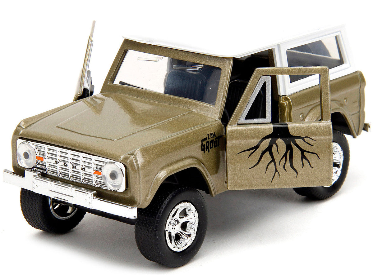 1973 Ford Bronco Gold Metallic with White Top and Groot Diecast Figure "Guardians of the Galaxy" "Marvel" Series 1/32 Diecast Model Car by Jada-1