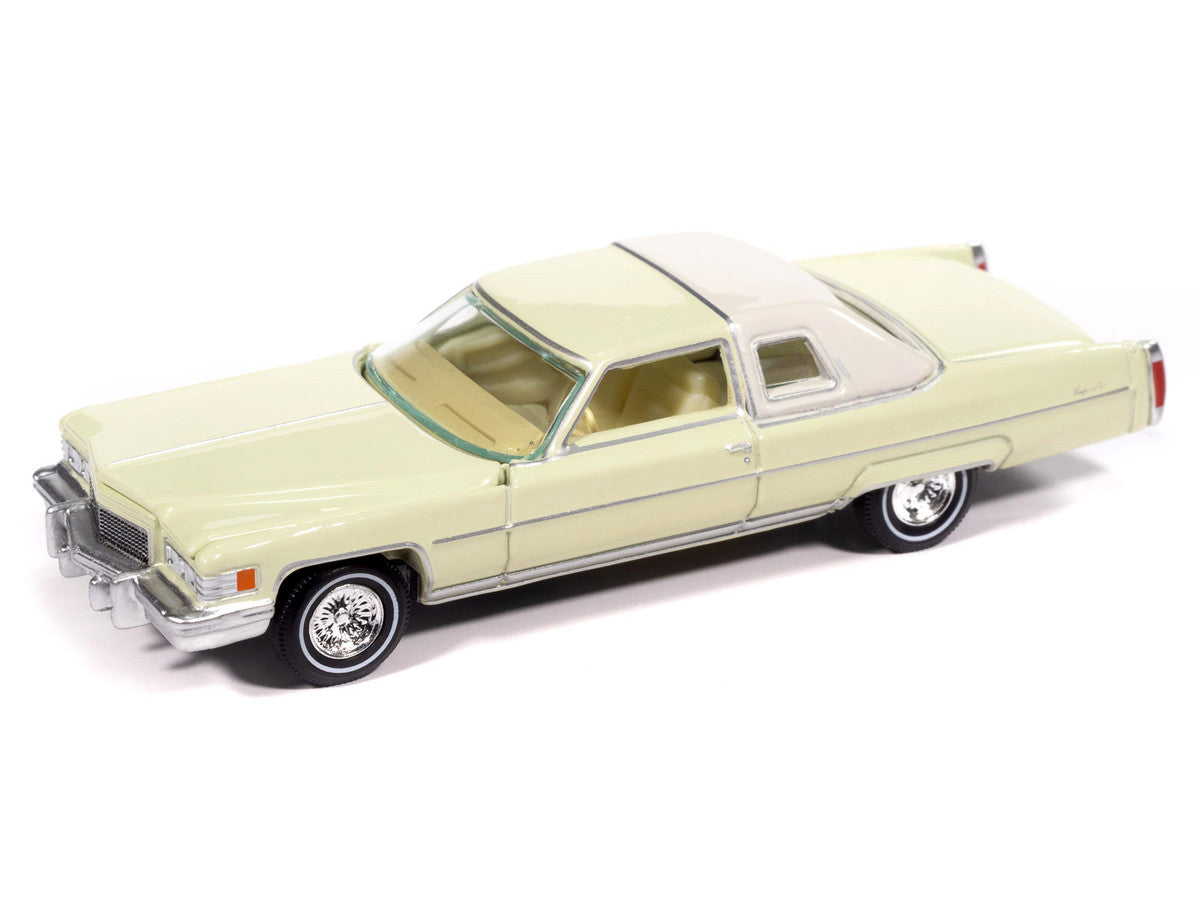 1976 Cadillac Coupe DeVille Phoenician Ivory "Luxury Cruisers" Series 1/64 Diecast Model Car by Auto World-1