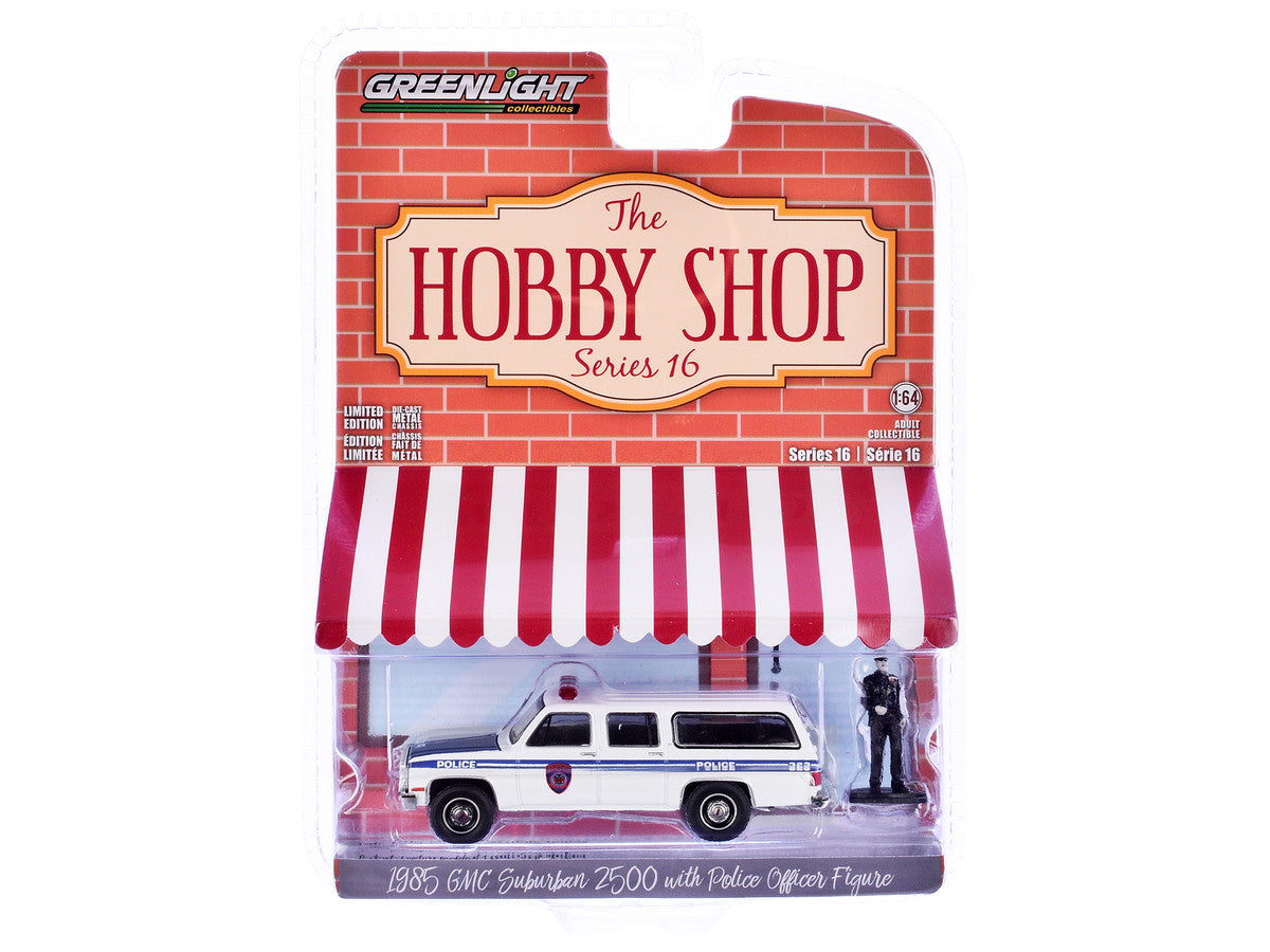 1985 GMC Suburban 2500 "New York City Transit Police Department" White with Blue Stripes and Police Officer Figure "The Hobby Shop" Series 16 1/64 Diecast Model Car by Greenlight-1