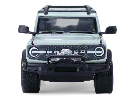 2021 Ford Bronco 4-Door Badlands Cactus Gray with Black Top and Motorcycle with Utility Trailer "Hitch & Tow" Series 33 1/64 Diecast Model Cars by Greenlight-2