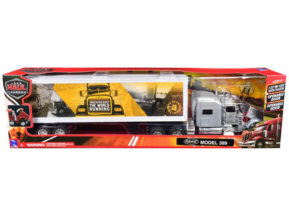 Peterbilt 389 Truck Silver Metallic with Dry Van Trailer "Trucker Keep The World Running" "Long Haul Truckers" Series 1/32 Diecast Model by New Ray-1