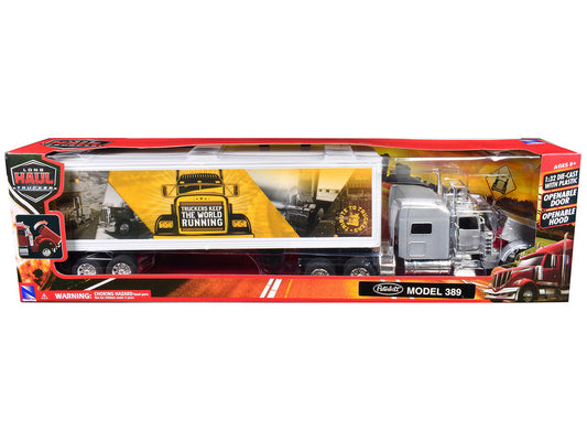 Peterbilt 389 Truck Silver Metallic with Dry Van Trailer "Trucker Keep The World Running" "Long Haul Truckers" Series 1/32 Diecast Model by New Ray-1